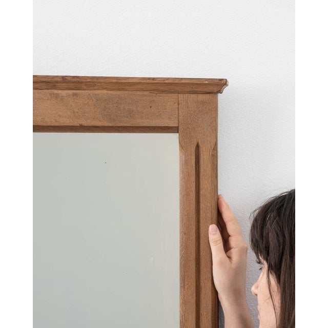A mirror whose natural honey oak frame, rectangular gives it real character at first glance. Originating in France during...