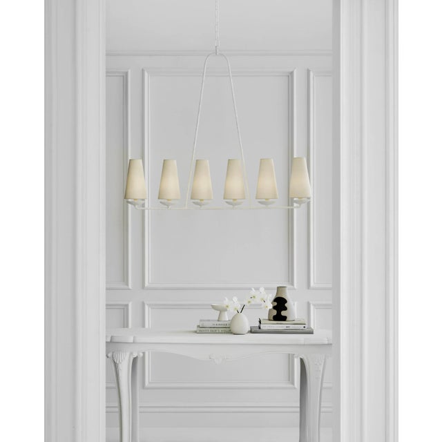 Fontaine Linear Chandelier in Plaster with Linen Shades Designer: AERIN Canopy: 6" Round Mounting: Chain Shade Detail: 3"...