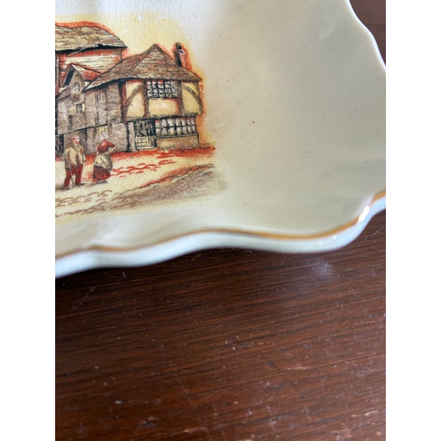 A delightful and collectible piece of English Staffordshire pottery, this vintage Sandland Ware trinket dish is one of...
