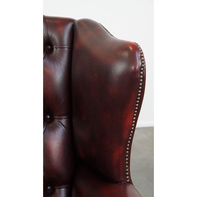 Classic Red Cowhide English Chesterfield Wing Chair with an Exceptionally Wide Seat For Sale - Image 11 of 15