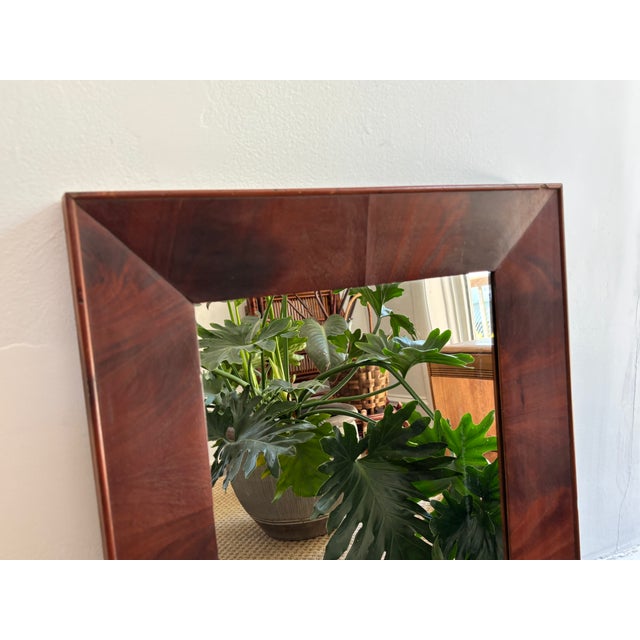 Antique wall mirror with a flame mahogany veneer. Beautifully hand crafted by a skilled, but unnamed artisan. Please see...