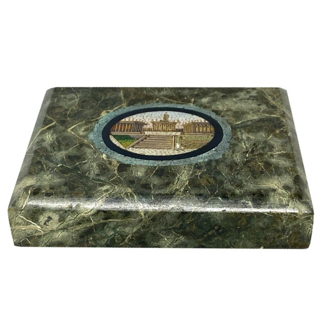 A fine 19th c. Roman Grand Tour micro mosaic paperweight, inlaid in a verde antico green marble with a border of onyx. and...