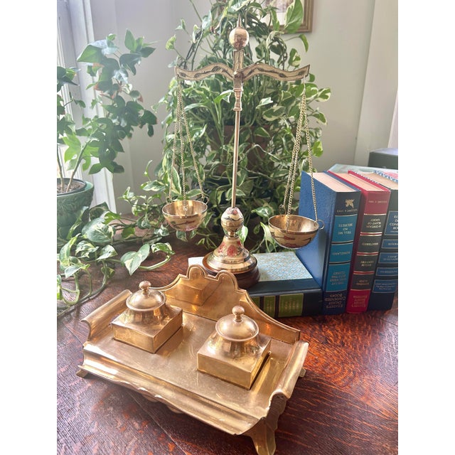 This is a mid-20th century decorative brass balance scale, probably Italian, dating roughly 1950s–1970s. The hand-painted...