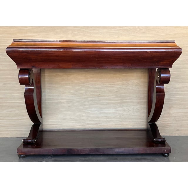 Absolute unique walnut wall console table artfully made in the early Biedermeier period circa 1830 in Austria. Made with...