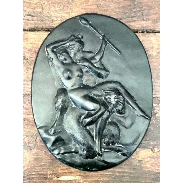 Crafted from vibrant green glass, this vintage relief sculpture depicts a dynamic Art Nouveau scene with figures rendered...