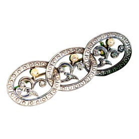 Gold and Silver Brooch with Interlaced Links and Diamond Chips For Sale