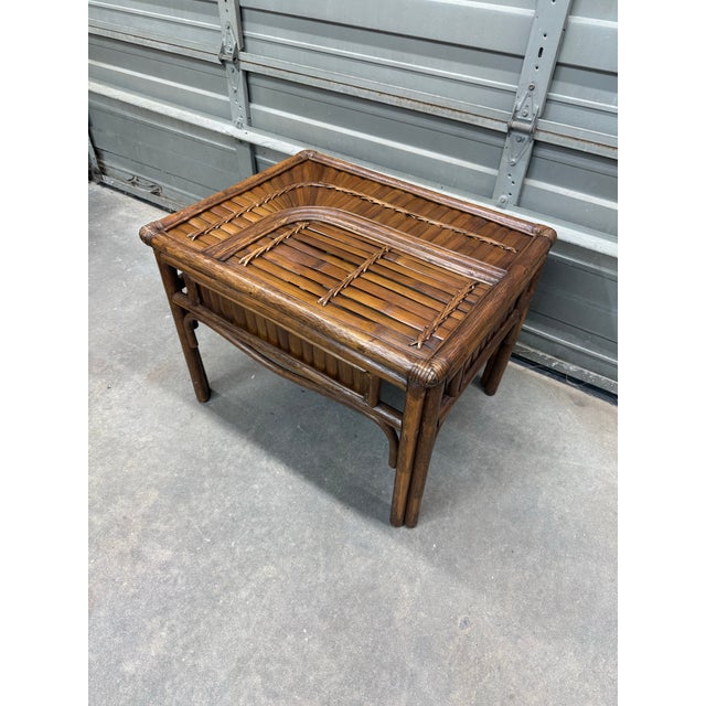 A beautiful bamboo side or end table featuring split bamboo detailing with intricate woven detail with rising sun bamboo...