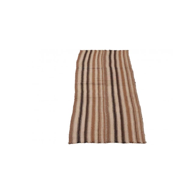 Vintage handwoven natural wool kilim rug from Kars region of Turkey. Approximatelly 50-60 years old. In very good...