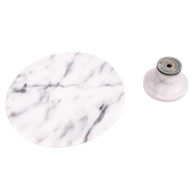 Made for both hosting and daily organization, this tall marble lazy Susan combines beauty and function. The solid marble...