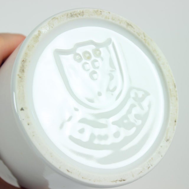 Set of two beautiful midcentury modern vases. Produced in heavy ceramics, the vases show a typical mid century design....