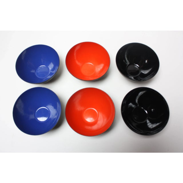 Set of six 1970s Krenit snack bowls by Herbert Krenchel. Black metal with blue, black and orange enamel interiors. (Set...