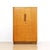 This gentleman's armoire was designed and manufactured during the 1950’s by Ton of Czechoslovakia. Produced in light oak...