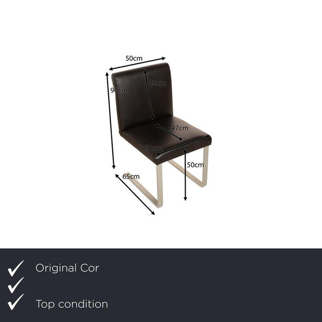 The Quant chair set from Cor is covered in black genuine leather and stands on silver metal feet. It is characterized by...