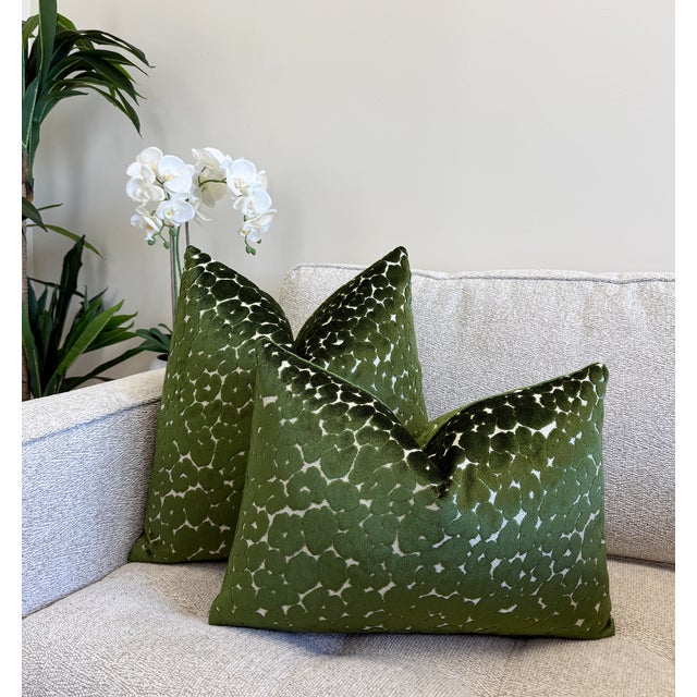 This elegant pillow showcases a dark green leopard velvet print, providing a calming influence in any space. The velvet's...