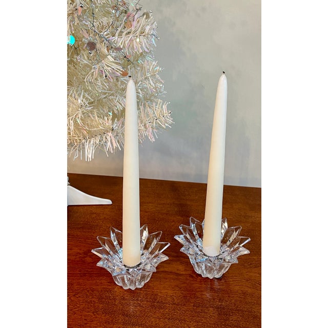 A pair of 1990's Mikasa lead crystal candle holders cut in the "Bridgeton" starburst style. Perfect for the holidays.