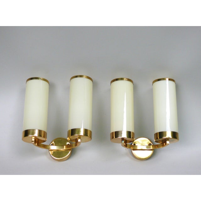 A pair of elegant wall lights from the Bauhaus era, featuring the typical austere design language of the time, made in...