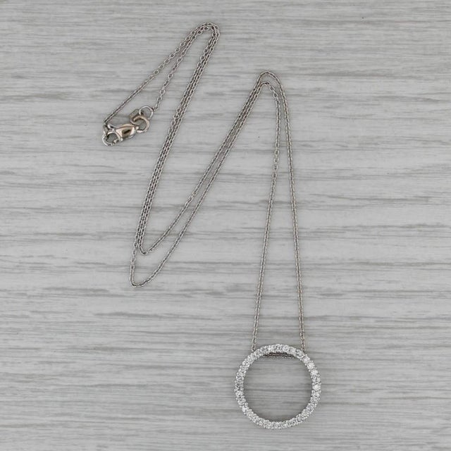 Gemstone Information: - Natural Diamonds - Total Carats - 0.47ctw Cut - Round Brilliant Color - E - G Clarity - VS2 - SI1...