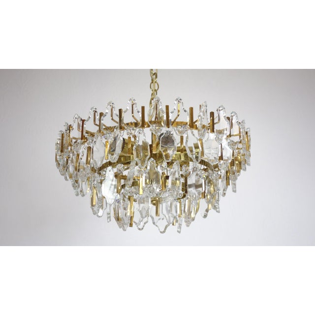 Brass and Lead Crystal 6-Light Chandelier from Palwa, 1960s, in Very Good conditions. Designed 1960 to 1969 This piece has...