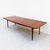 Richard Thompson's walnut extension dining table, designed for Glenn of California in the 1960s, is one of our favorites....