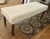 White cotton linen blend upholstered bench. Bobbin style legs. Bench by Forty west, reupholstered by local upholstery...