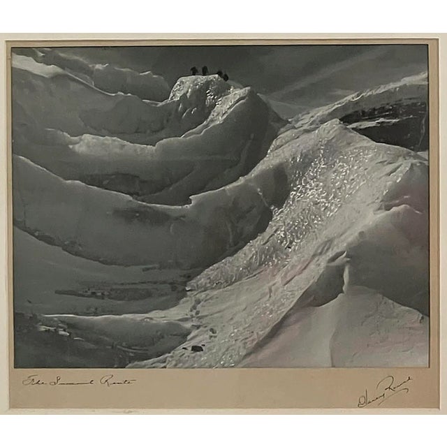 An original signed silver gelatin print entitled “The Summit Route” photographed in the northern Rockies by the important...