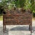 Embrace the allure of vintage charm and modern sophistication with this Currey and Company credenza. Crafted with a...