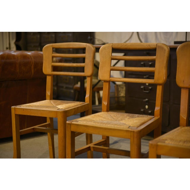 A set of six French chairs from the 1950s, with a simple and well-balanced design. Light wood frame with a horizontal...