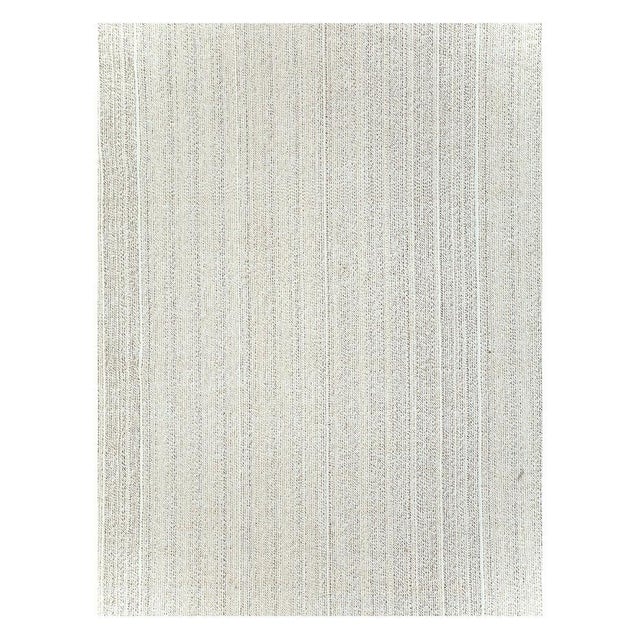 A vintage Turkish flatweave Kilim room size carpet handmade during the mid-20th century in shades of white and brown....
