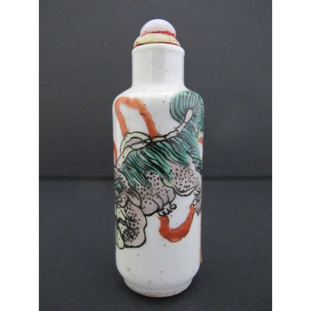 Chinese Chinese Porcelain Enameled Lion Foo Dog With Unraveling Ball Snuff Bottle For Sale - Image 3 of 10