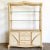 Exceptional vintage postmodern Etagere. Features a pencil reed ribbon frame with tessellated stone throughout the surfaces.