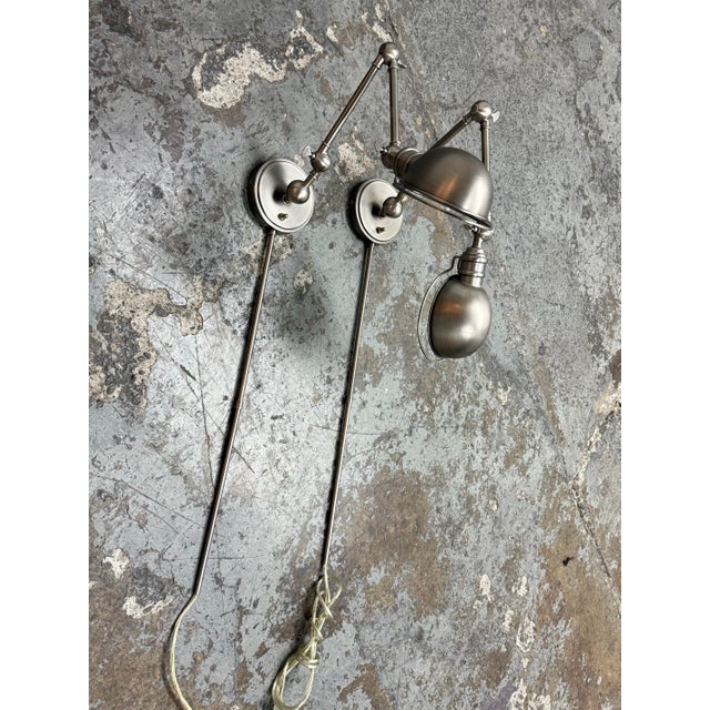 Design Plus Gallery presents a Pair of Academy Task Swing-Arm Wall Sconces from Restoration Hardware. Inspired by early...