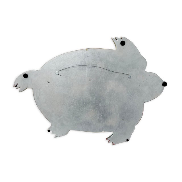 This signed mixed media hanging folk art turtle by Pat Custer Denison showcases a playful, expressive interpretation of...