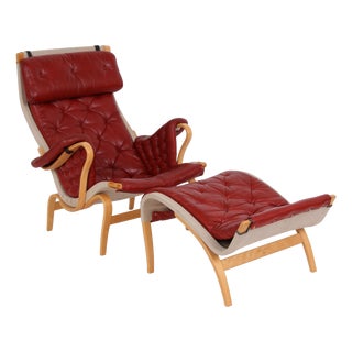 Set of Pernilla Lounge Chair and Ottoman by Bruno Mathsson for Dux, 1970s For Sale