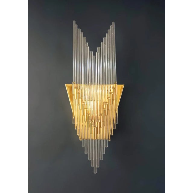 Italian wall lights with clear hanging waterfall glass rods mounted on triangular gold metal structures / Made in Italy by...
