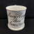 Beautiful British mug commemorating the birth of Mary Huggam, born June 9th, 1851. White porcelain with gold lettering and...