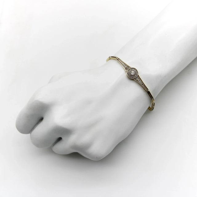 This is part of Chairish’s Fine Jewelry assortment. This gorgeous Art Deco bracelet centers around an Old European Cut...