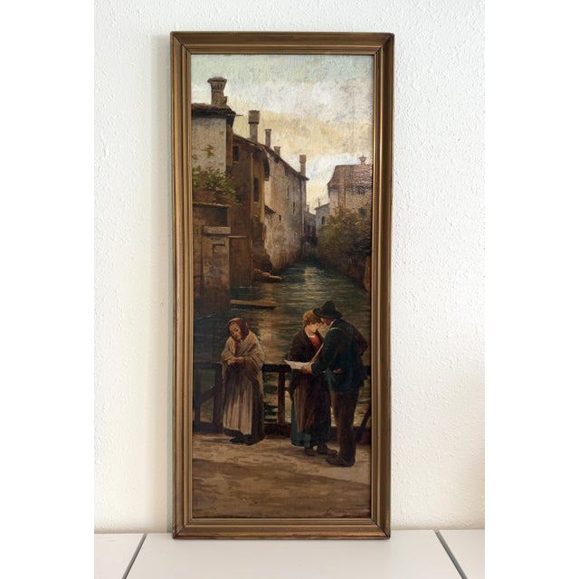This atmospheric antique oil painting by V. Campiniz depicts a quiet canal lined with historic European architecture,...