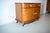 This is a nostalgic Art Deco chest of drawers from the 1930s. The chest of drawers impresses with its striking veneered...
