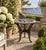 A beautiful vintage cast iron nautical garden sundial with a boat, reading "Tempus Fugit," which translated from Latin...