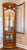 Vintage-Style Tall Oak Curio Display Cabinet W/ Illuminated Glass Shelves, Magnetic Doors & Antique Brass Knobs For Sale - Image 17 of 18