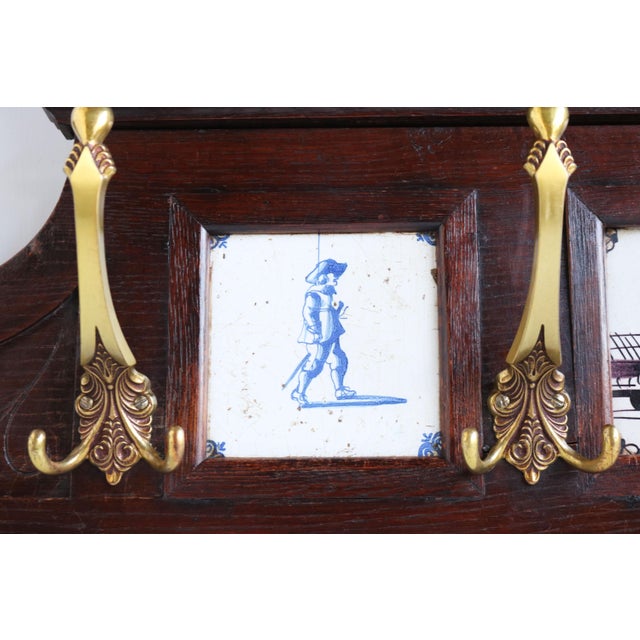 Gorgeous & very rare! This Dutch 19th century antique Renaissance Revival Coat rack / hat rack with Delft Blue tiles....