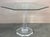 Lucite pedestal base dining table with octagonal glass top. Dimensions: Height: 29.34 in (74.5 cm)Width: 46.46 in (118...