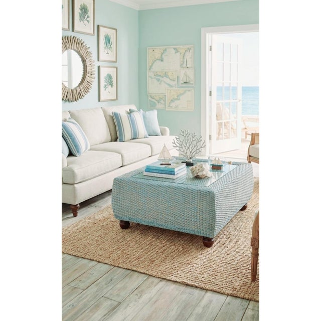 Elevate your space with this stunning coastal chic woven wicker custom painted coffee table by high-end maker Century...