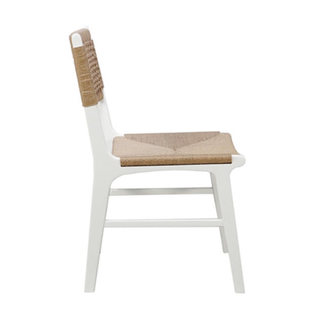 New special order item. Not vintage. Elevate your space with the distinctive rattan-wrapped Monroe Dining Chairs from...