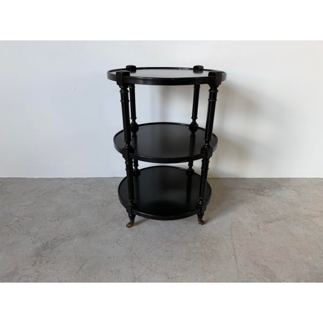 1960s Hollywood Regency Black Ebonized Three-Tier Side Table on Brass Casters For Sale - Image 4 of 12
