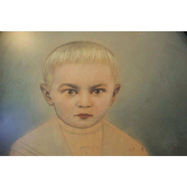 Intense photograph and/or pastel drawing of a boy. This may be a photograph with an overlay of a pastel drawing. Original...