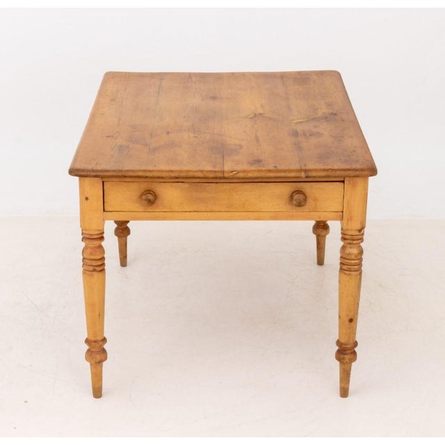 American Pine Wood Work Table, with single drawer on turned wood tapered legs. 30" H x 47.5" W x 34.5" D. Provenance: From...