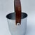 Circa 1940s Manning Bowman chrome ice bucket with bentwood handle. Made in the USA from quality materials. In good...