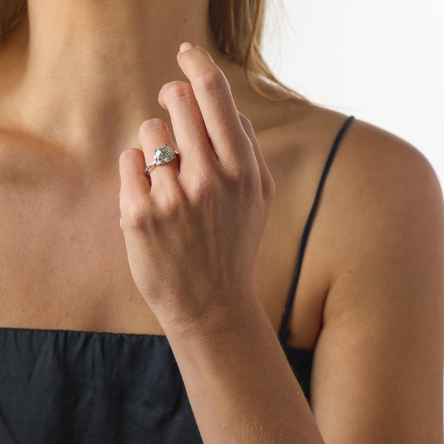 This Mid Century diamond engagement ring is a beautiful and timeless jewel from the 1950’s, crafted in platinum with a...