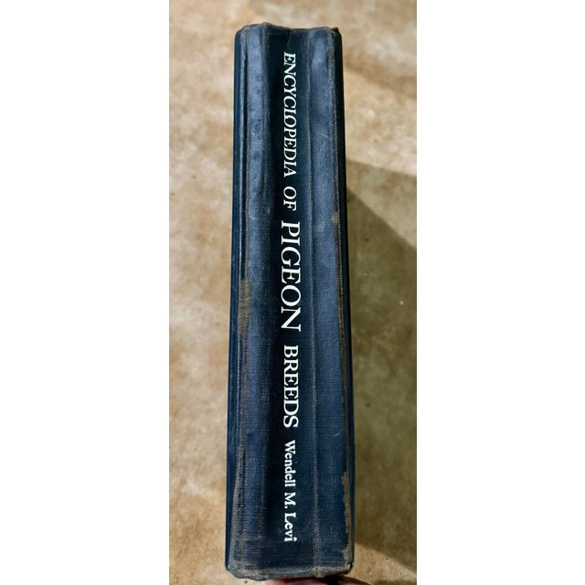 Up for sale is a rare vintage copy of "Encyclopedia of Pigeon Breeds" by Wendell M. Levi. Published in 1965 by T.F.H....